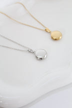 Mini relicario grabado