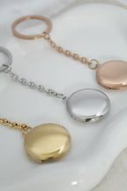 Llavero relicario redondo