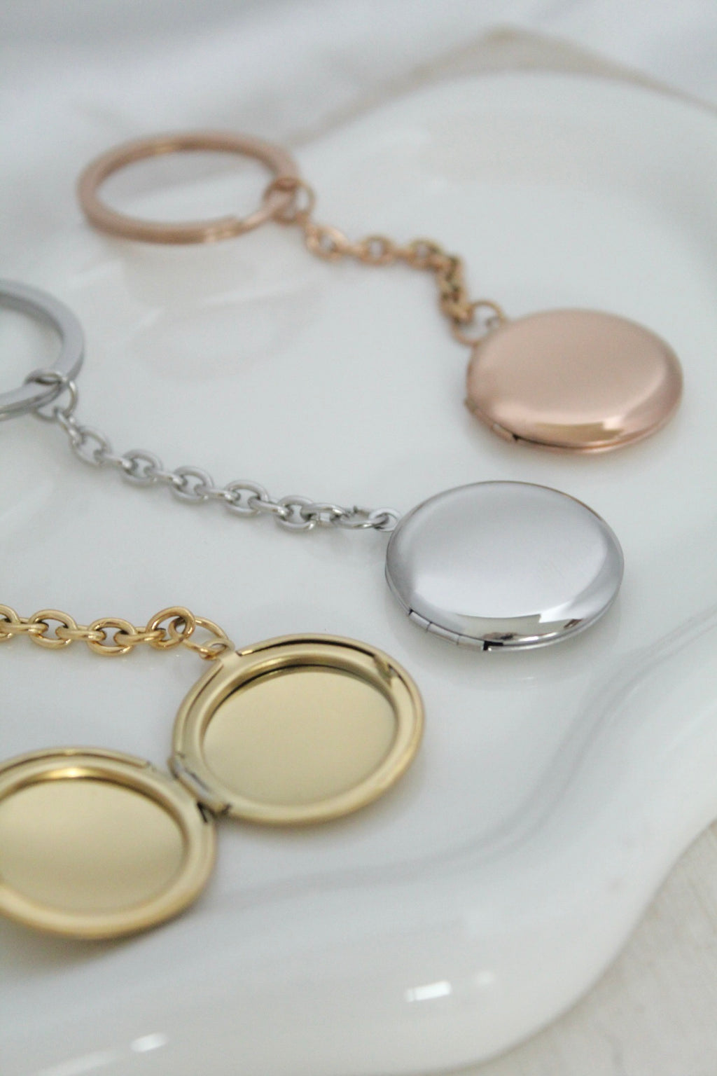 Llavero relicario redondo